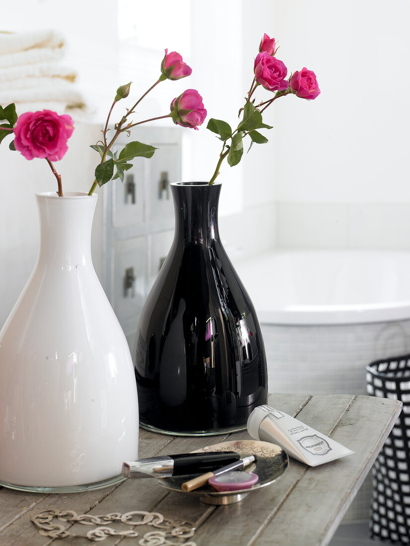 Flowers in black and white vases