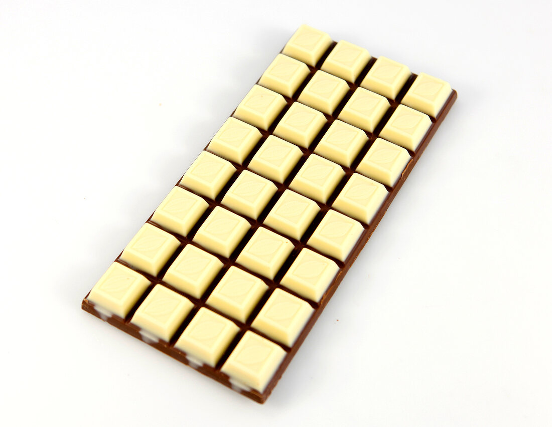 White milk chocolate bar on white background