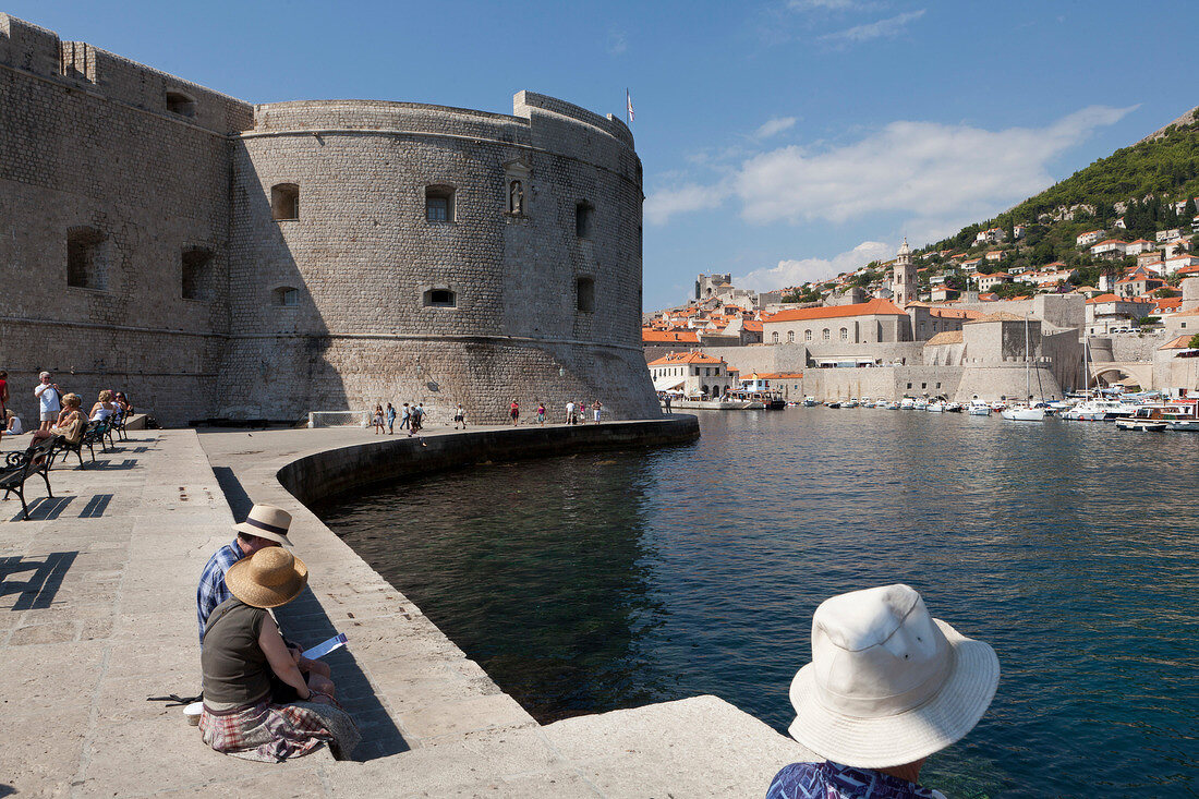Tourists at fortress Sveti Ivan in Dubrovnik, Croatia
