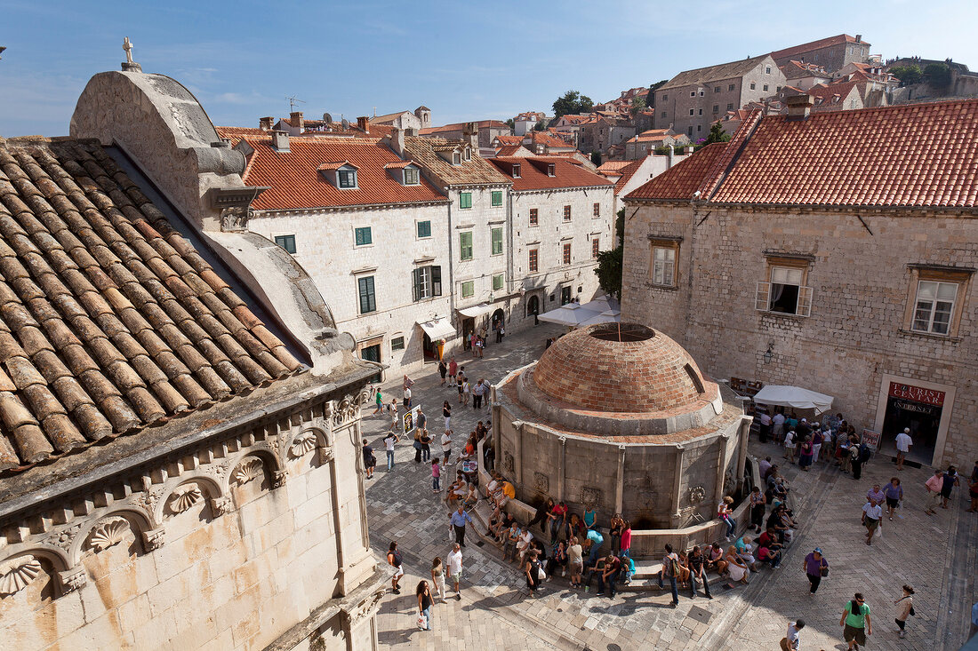 Tourists around Onofrio Fountain in Dubrovnik, Croatia