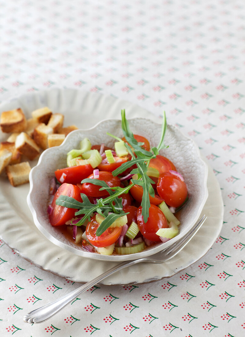 Colourful tomatoes salad in bowl