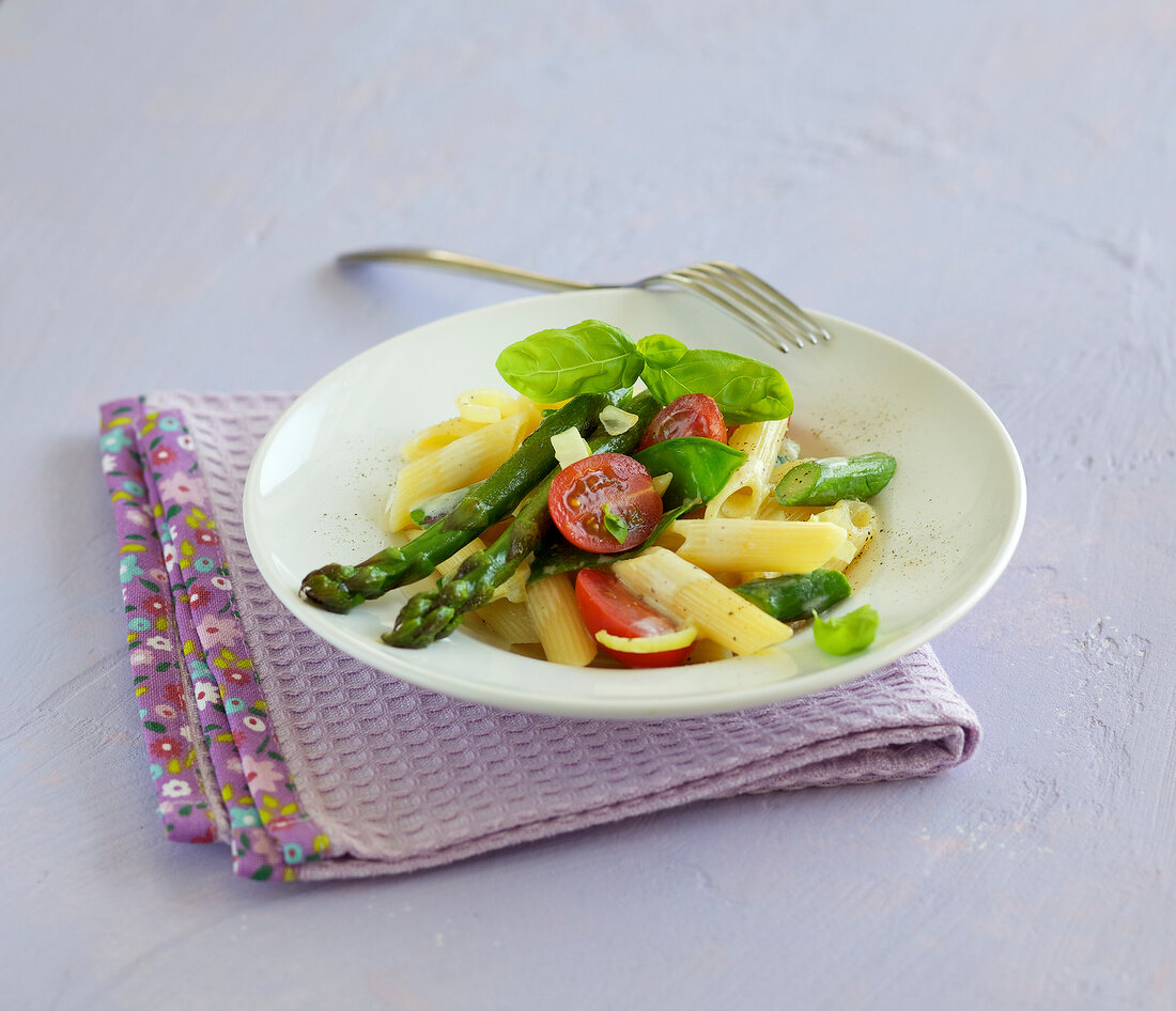 Green asparagus pasta on plate