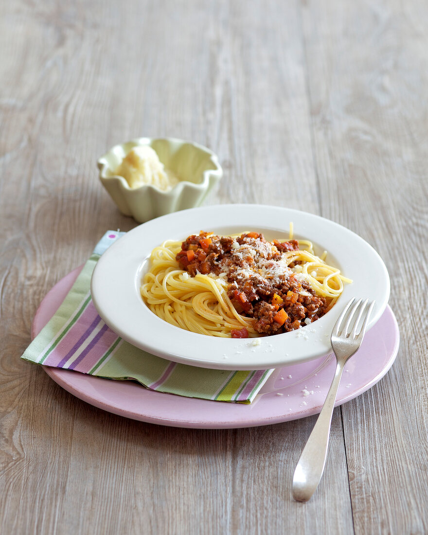 Spaghetti with bolognese sauce in serving dish