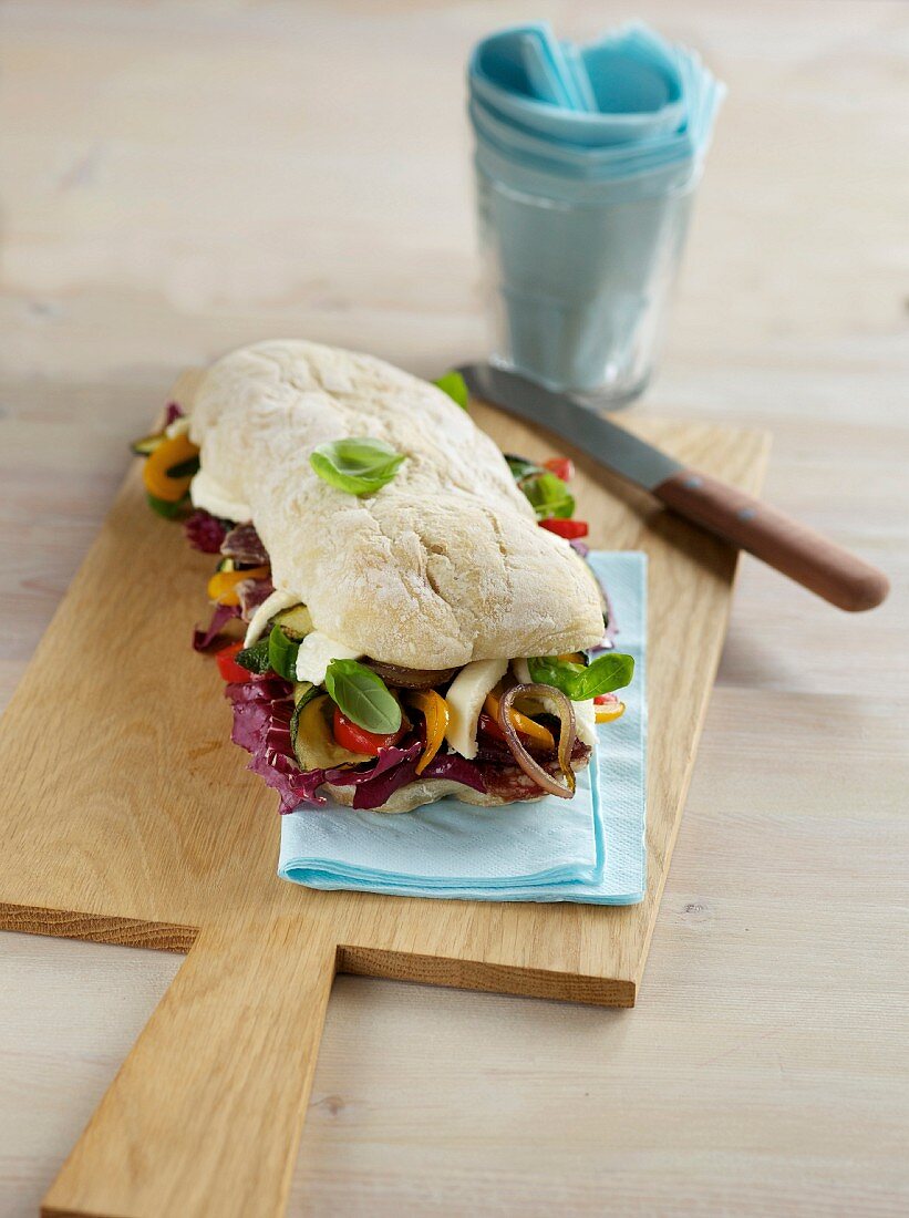 Ciabatta with salami and summer vegetables