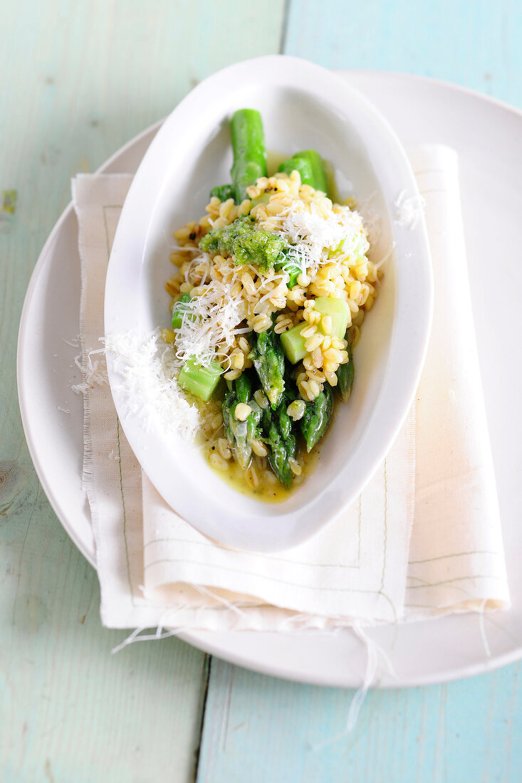 Asparagus wheat risotto on plate, low GI diet food