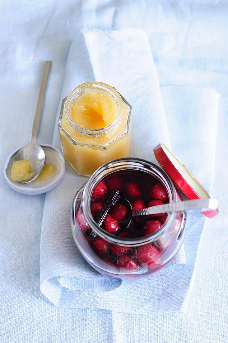 Homemade apple sauce and stewed cherries with vanilla