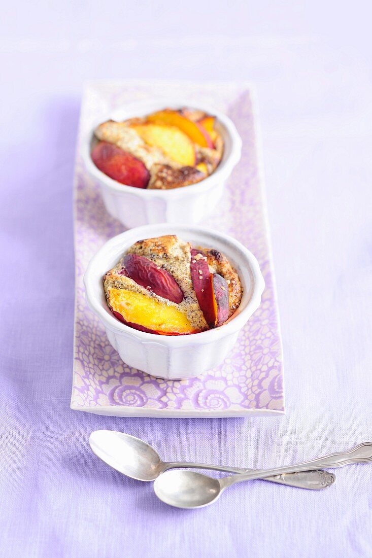 Baked peaches with poppy seeds in ramekins