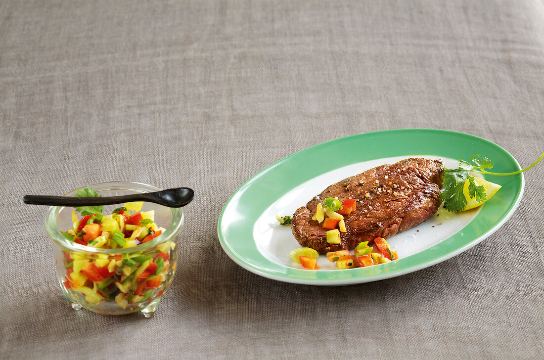 Steak with salad on plate 