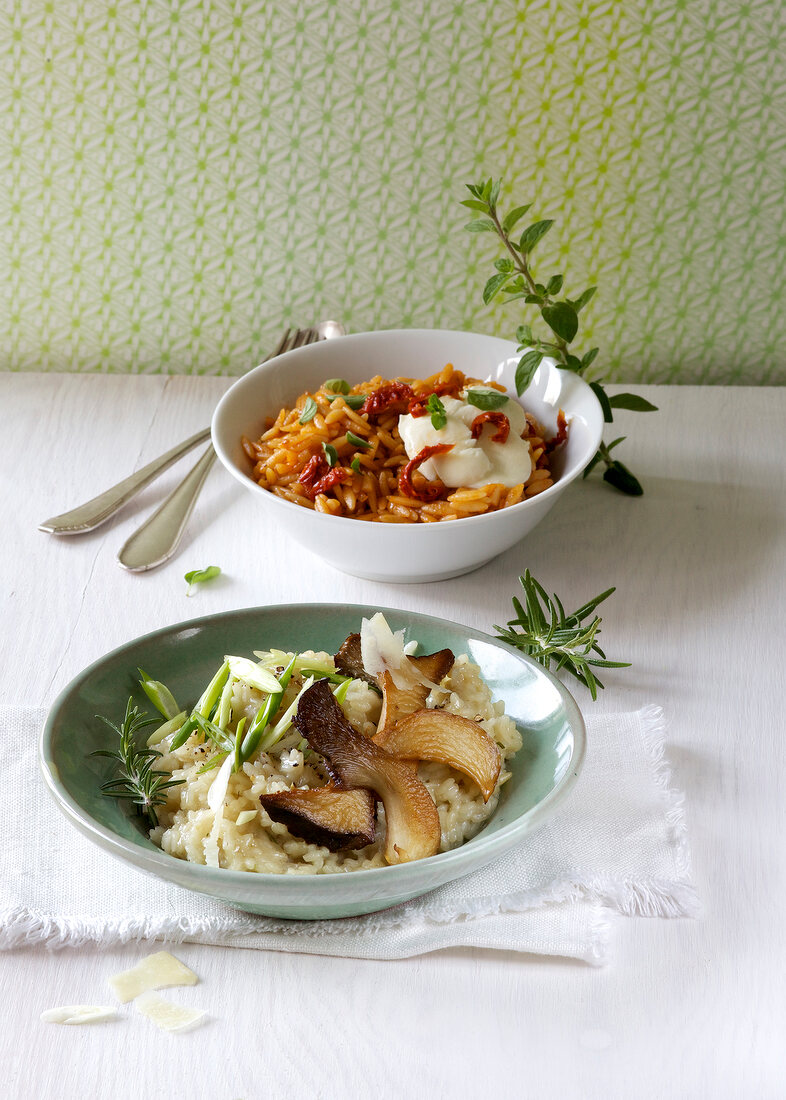 Two different risotto in bowls