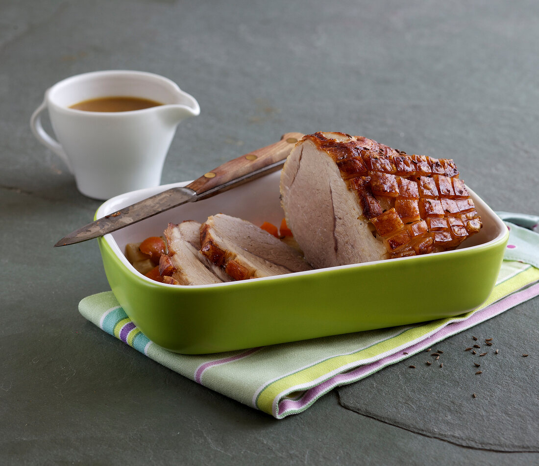 Roast pork with beer sauce in casserole