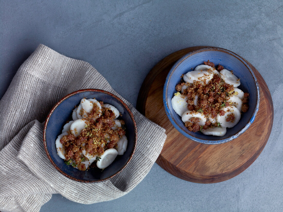 Bacon and lemon crumbs in bowls