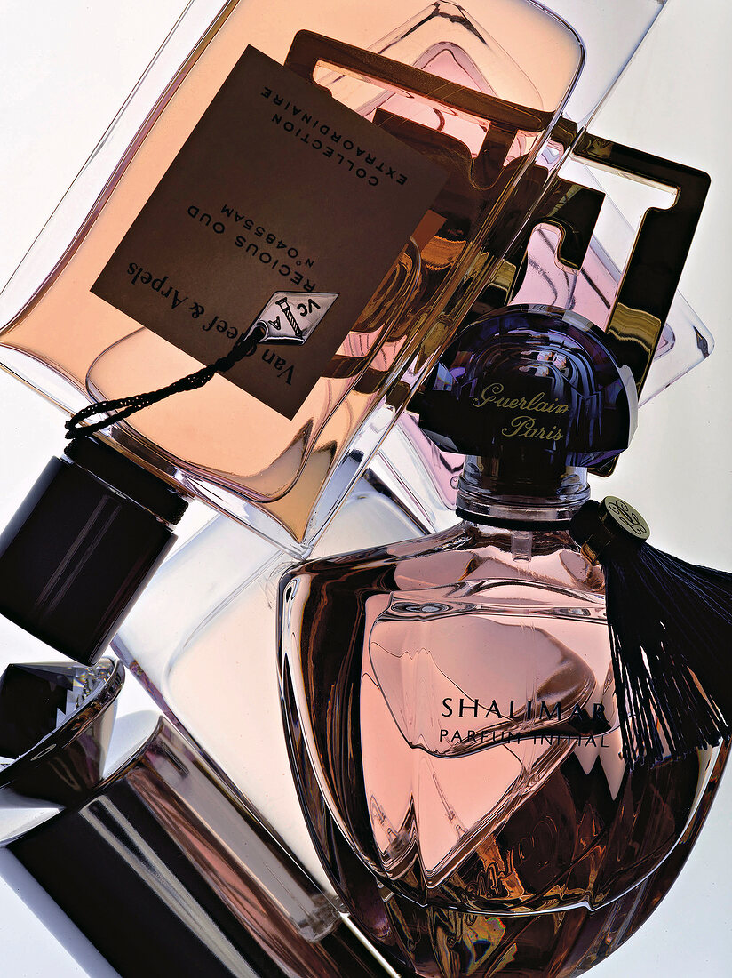 Close-up of various brown perfume bottles