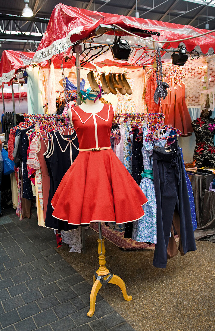 Clothes displayed at Old Spitalfields Market, London, UK
