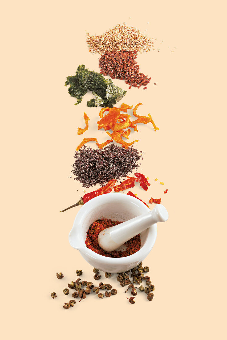 Shichimi and Japanese spice mixture on beige background