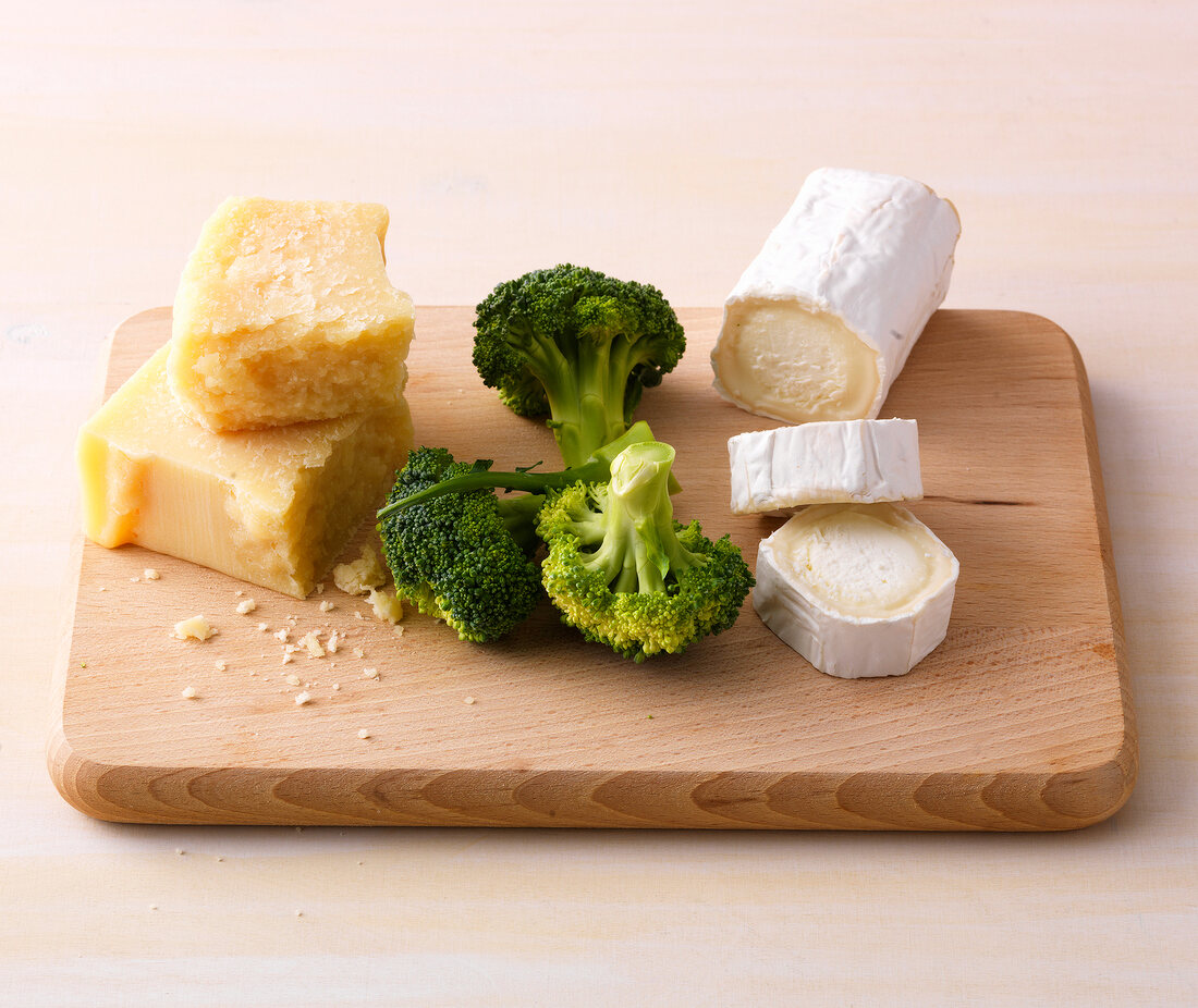 Food products with calcium on wooden board