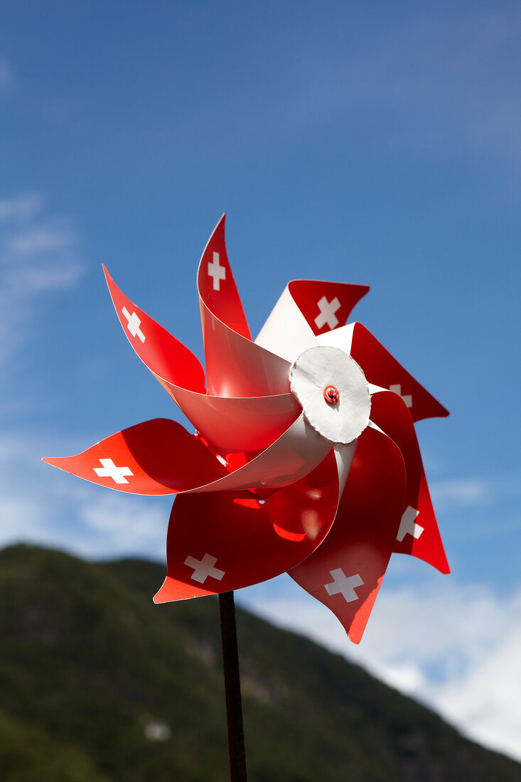 Close-up of wind turbine with the Swiss cross, Ticino, Switzerland