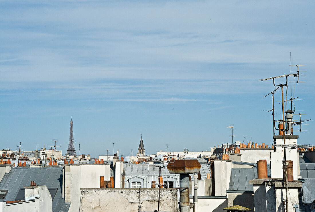 View of city and Eiffel tower from rooftop of Hotel Saint Severin, Paris