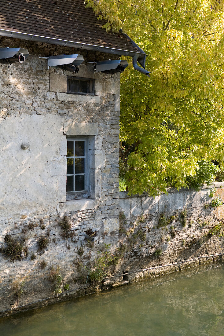 House on the river Loue in Ornans, Franche-Comte
