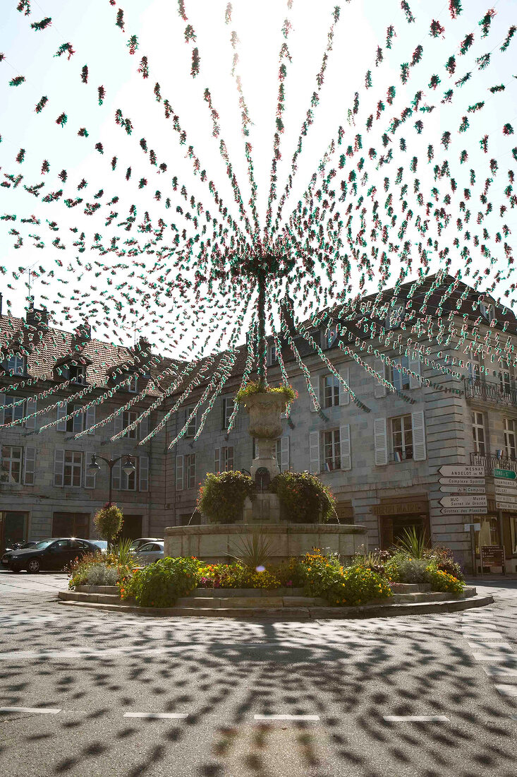 View of streets of Place de la Liberte in Arbois, Franche-Comte, France