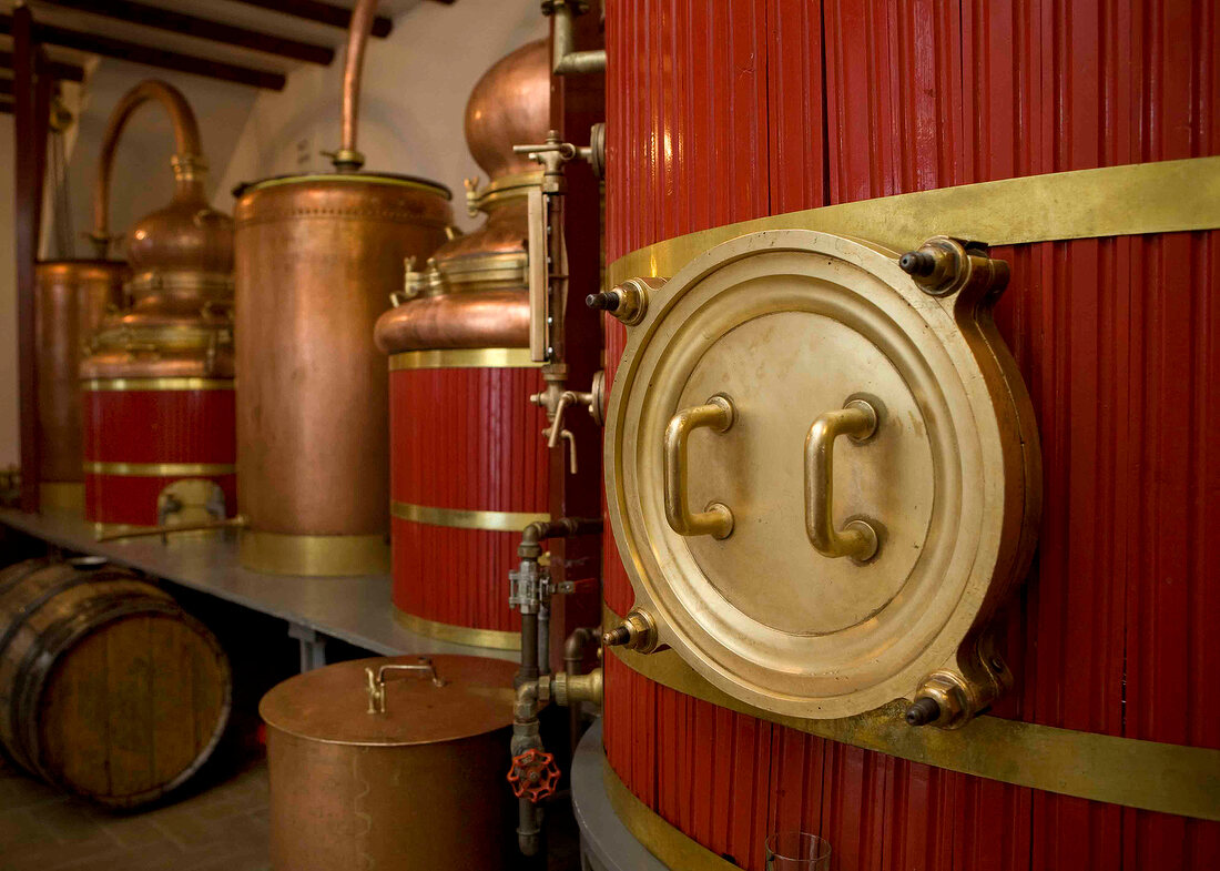 Barrels and containers in Pierre Guy distillery in Pontarlier, France