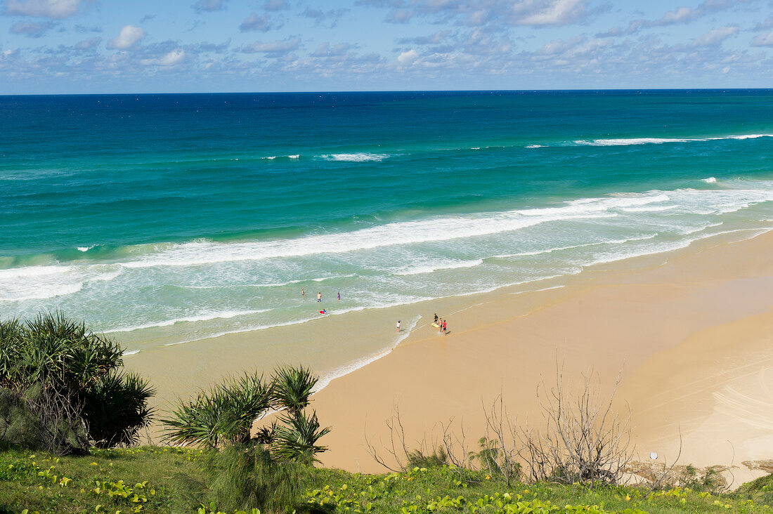 View of beach behind Indian head rock, Fraser Island, Queensland, Australia