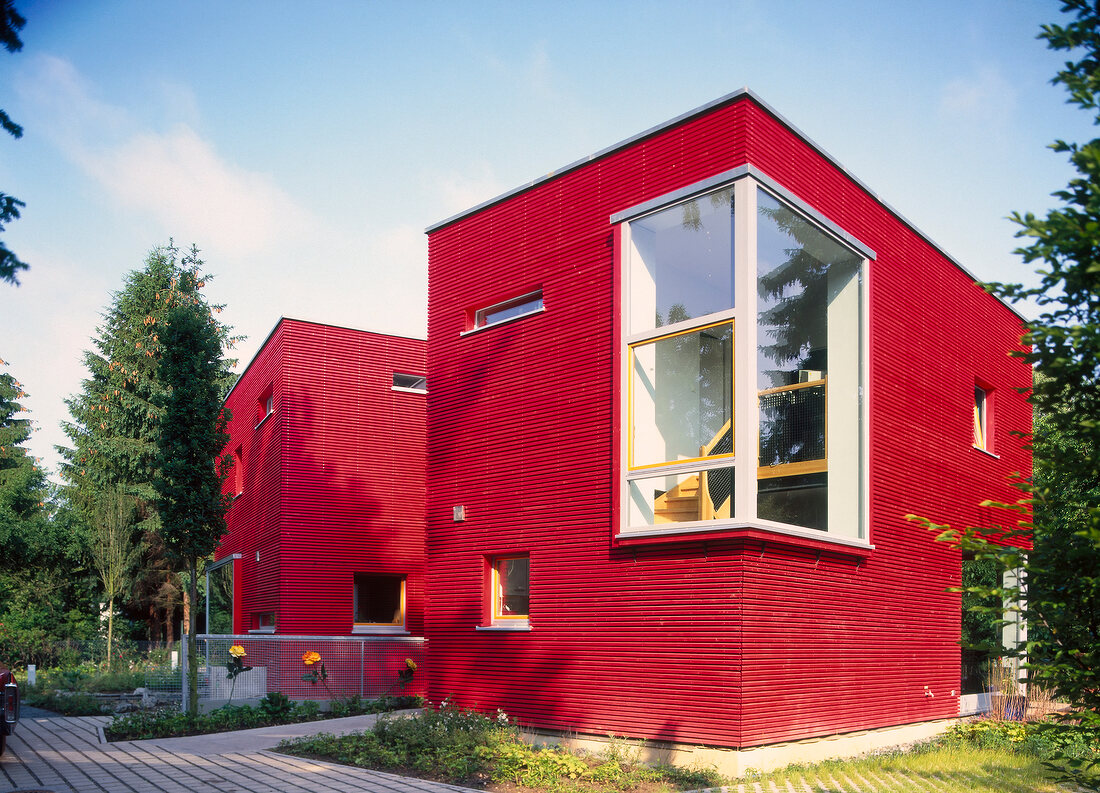 View of red cube shaped house