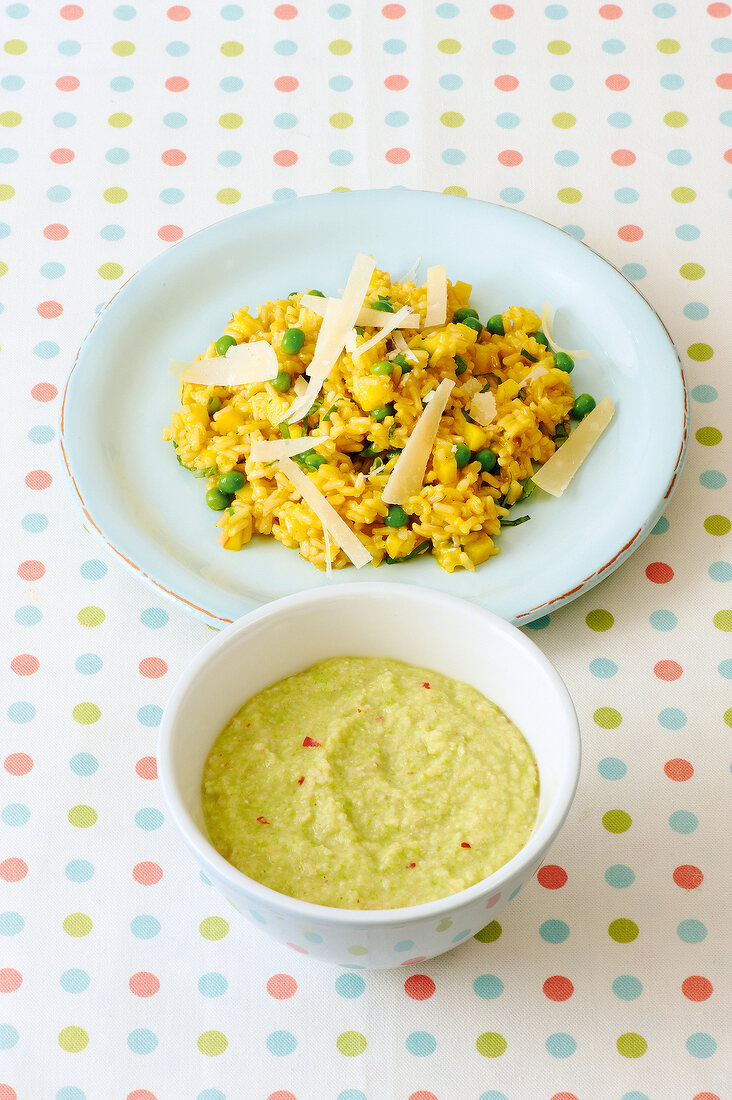 Bowl of porridge and risotto on plate for pregnancy and lactation