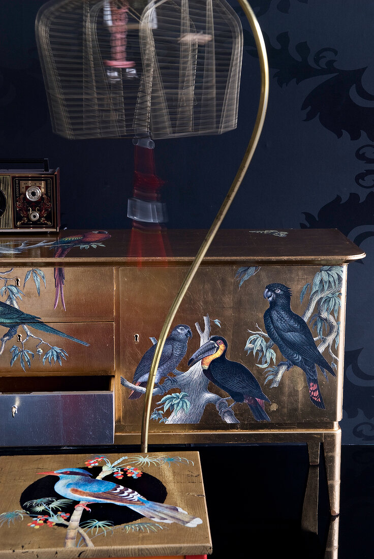Sideboard decorated with birds decoupage
