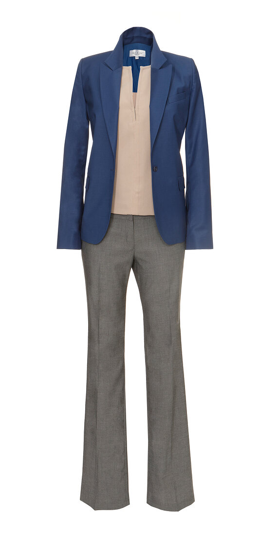 Blue blazer with beige silk shirt and suit pants on white background