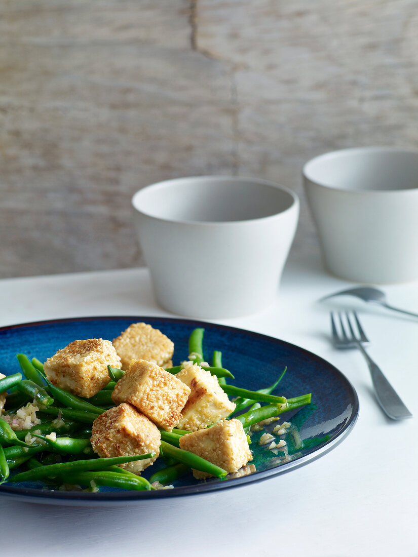 Close-up of bean salad with sesame tofu on plate