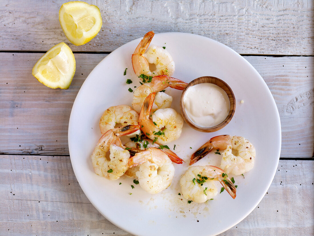 Shrimp with lemon aioli on plate