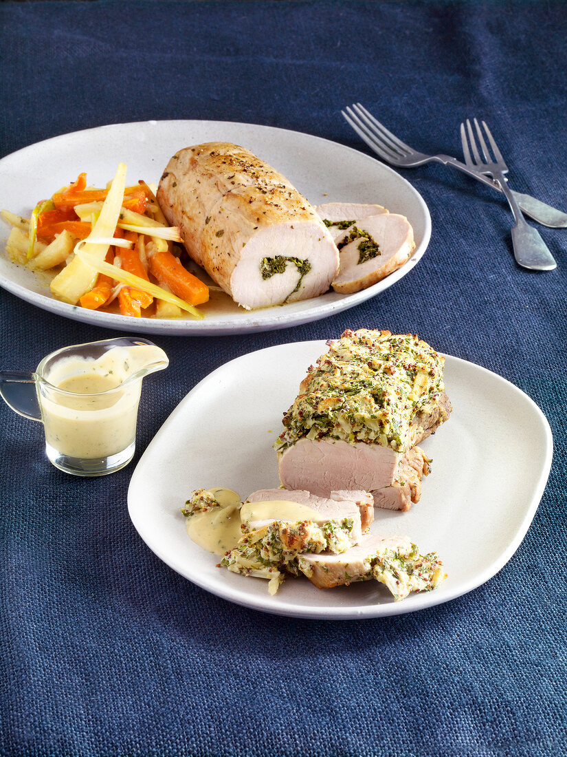 Two different types of cooked pig's meat on plates