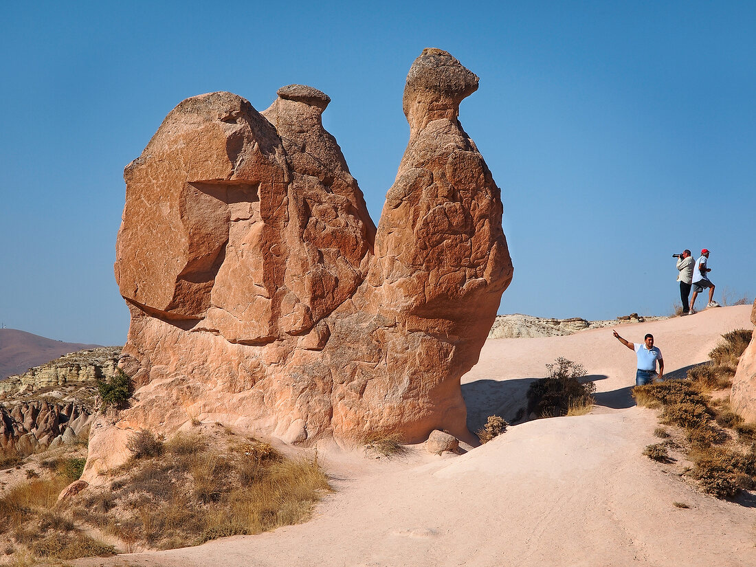 Tourist at Devrent Valley Camel Rock tuff, Cappadocia, Turkey