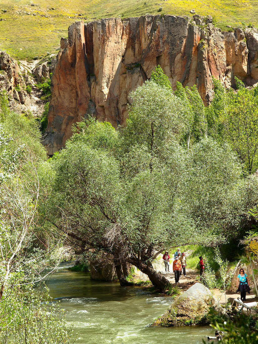 People walking in Ihlara Valley in Anatolia, Turkey