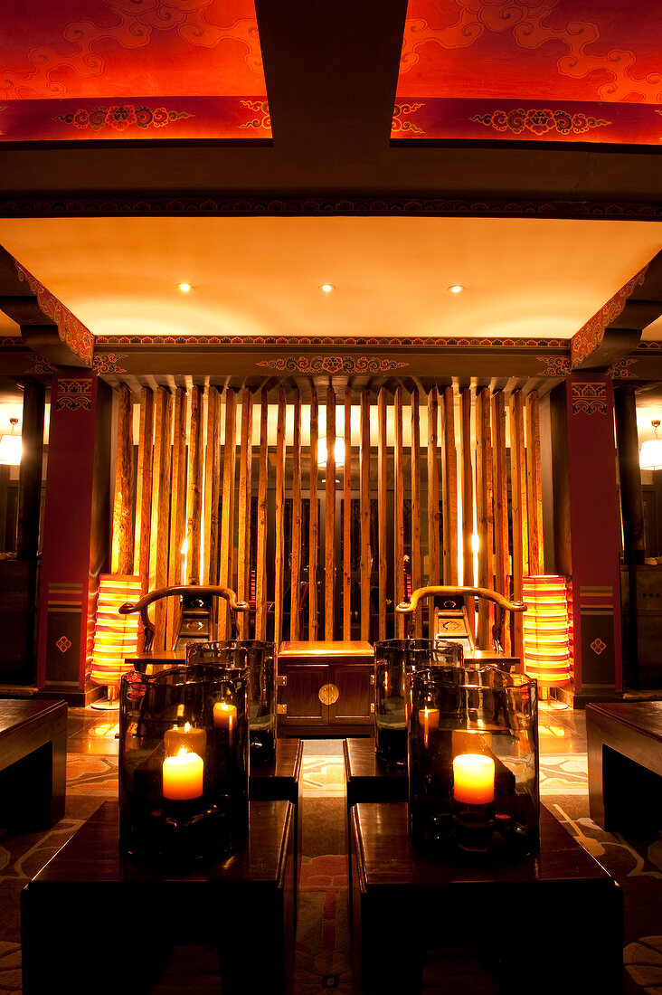 Interior view of illuminated lobby in Uma Paro hotel, Bhutan