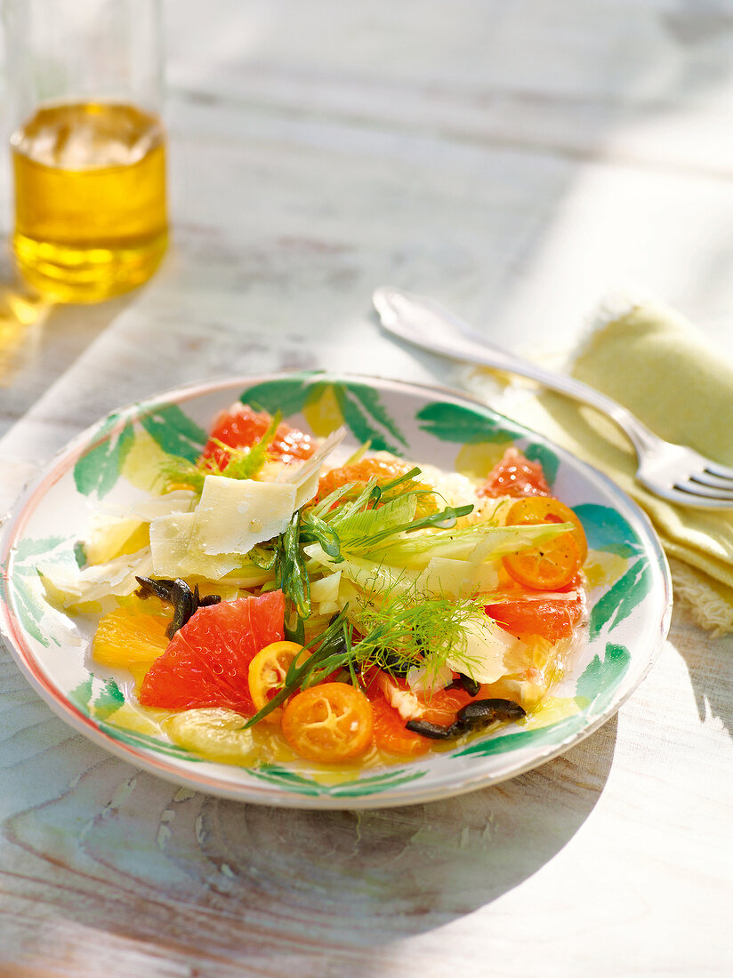 Salad of mixed citrus fruits on plate