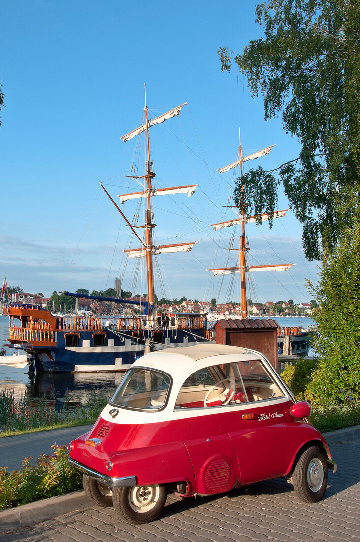 View of Isetta car beside lake in Mikolajki, Warmia-Masuria, Poland