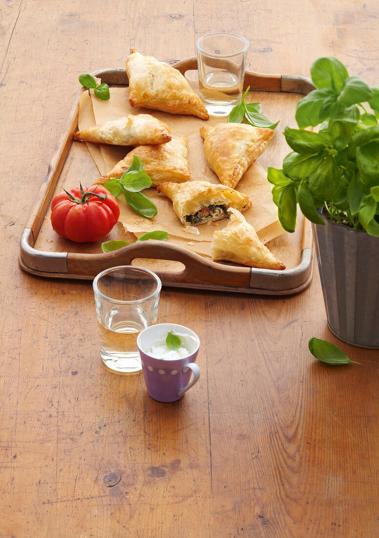 Puff pastry with spinach and ricotta filling in serving tray