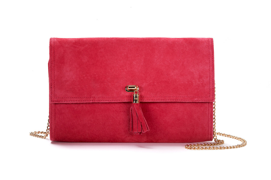 Red pocket purse with golden chain on white background