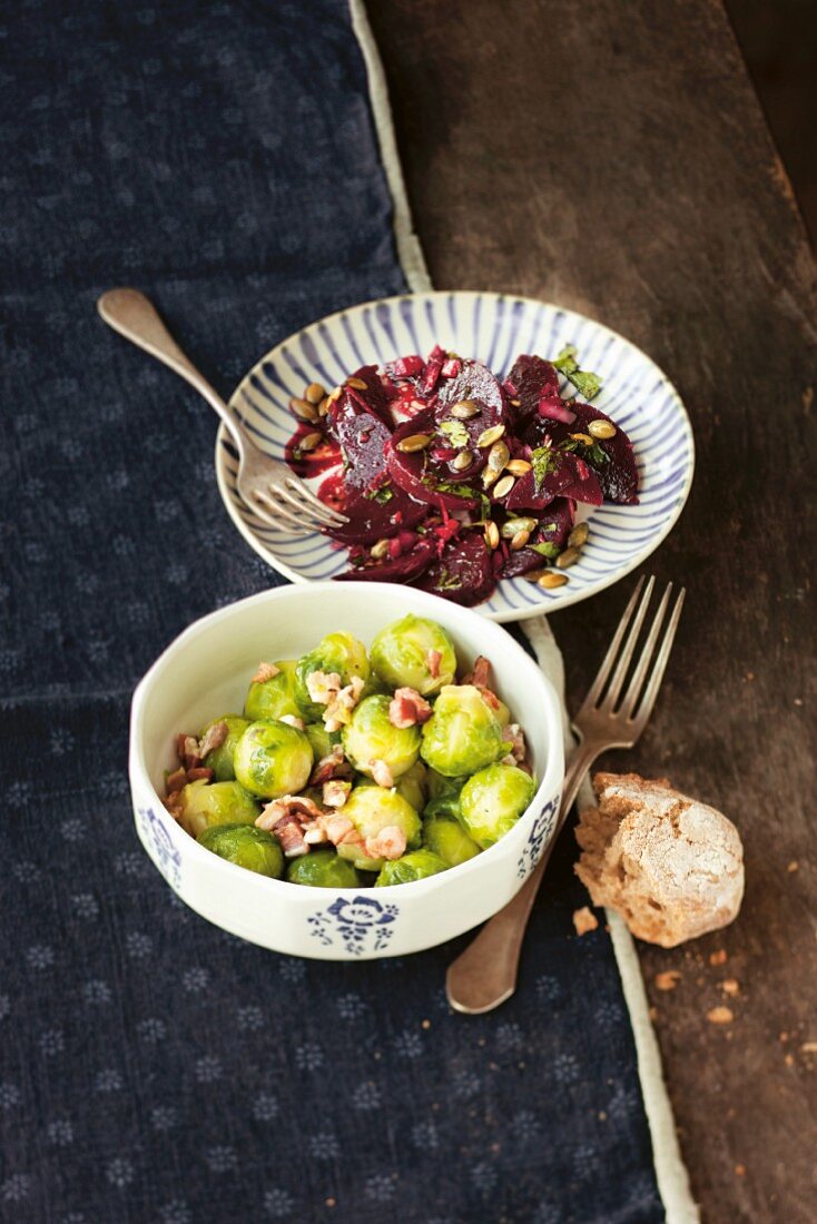 Brussels sprouts salad with bacon, and beetroot salad with pumpkin seeds