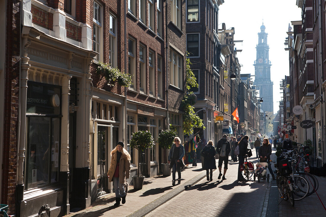 People strolling on Tichel street in Jordaan, Amsterdam, Netherlands