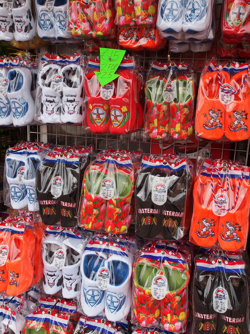 Different colourful clogs hanged in shop, Amsterdam, Netherlands