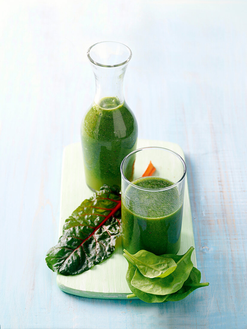 Green smoothie for sound sleep in flask and glass