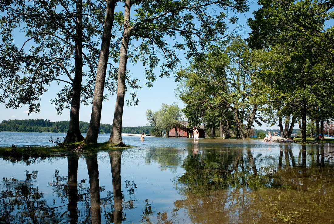 People having bath at Pietzing, Simssee, Bavaria, Germany