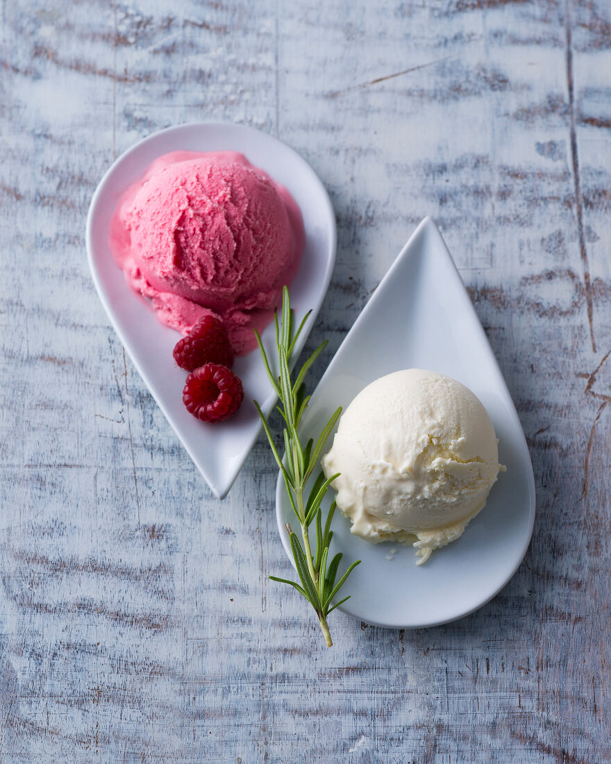Raspberry ice-cream and rosemary honey ice-cream in serving dish