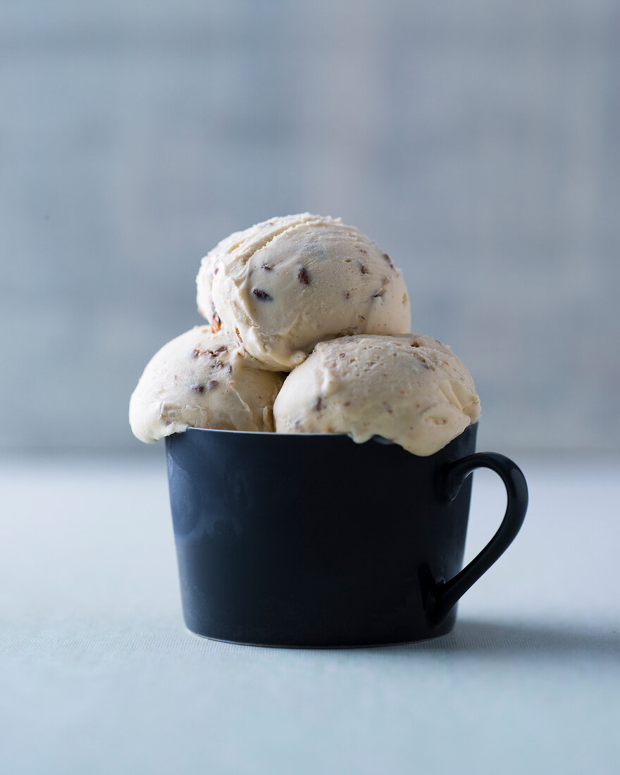 Walnut ice-cream in black cup