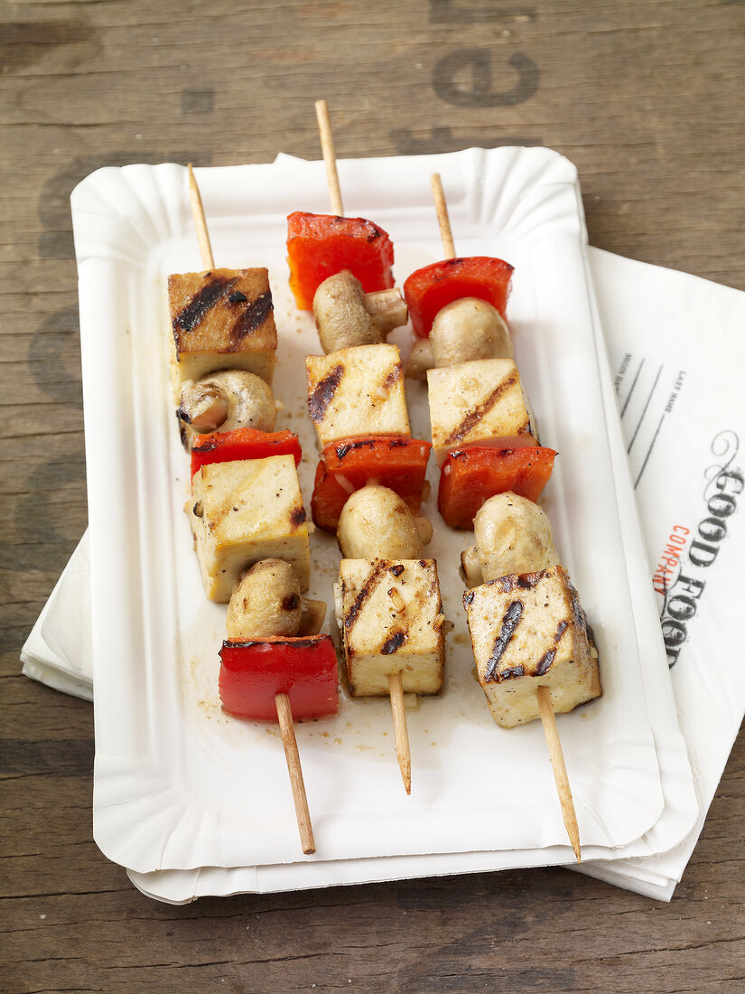 Paprika tofu skewers on plate