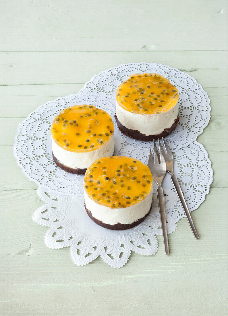Passion fruit tart with poppy seeds on mat