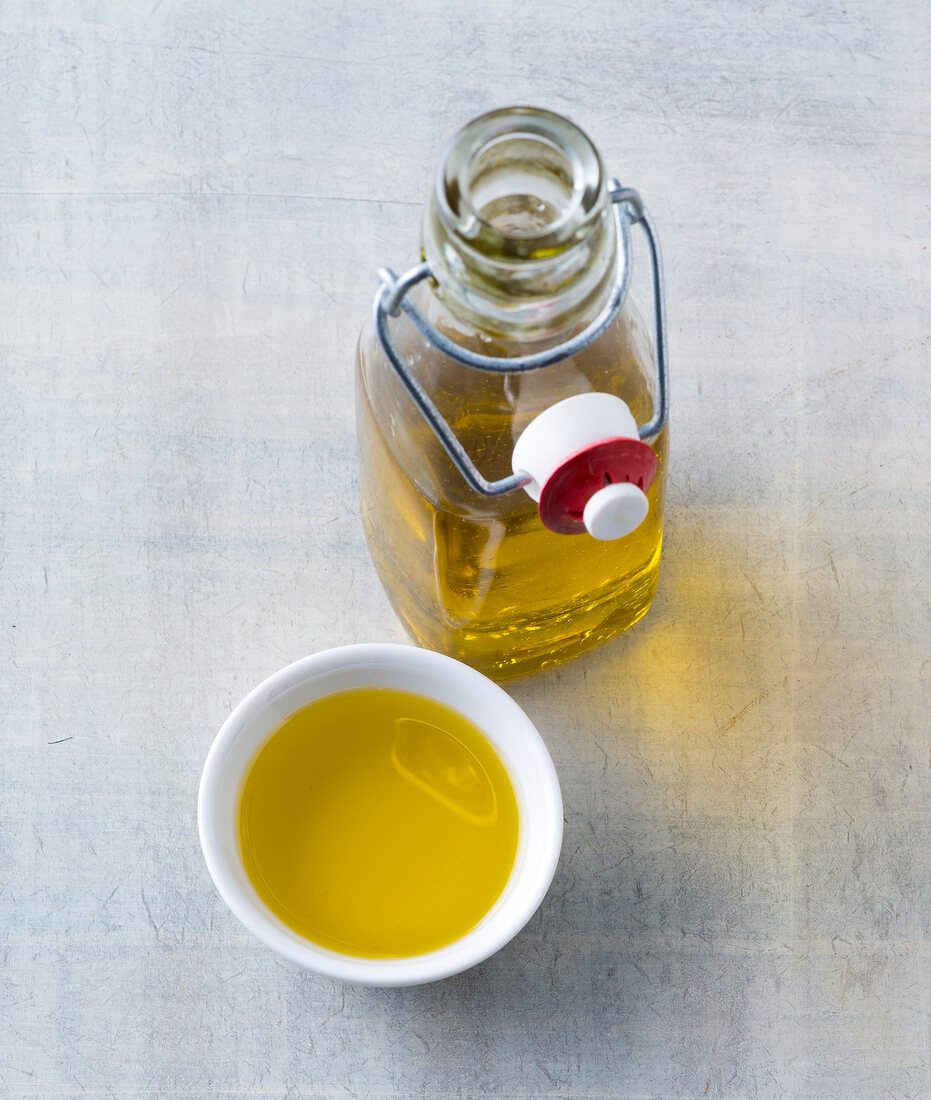 Olive oil in jar and bowl