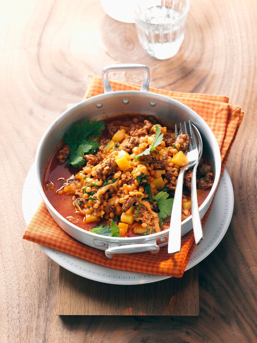 Various minced lentils and vegetables in wok